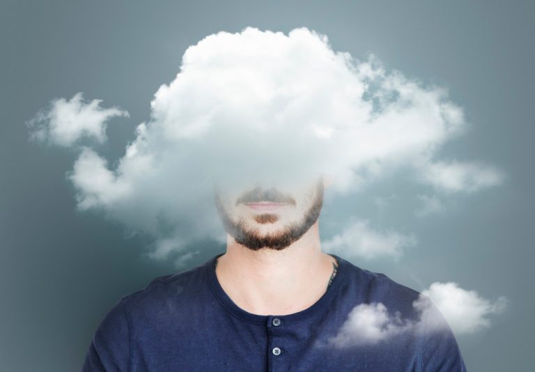 Clouds hiding a man's face, clouding judgement