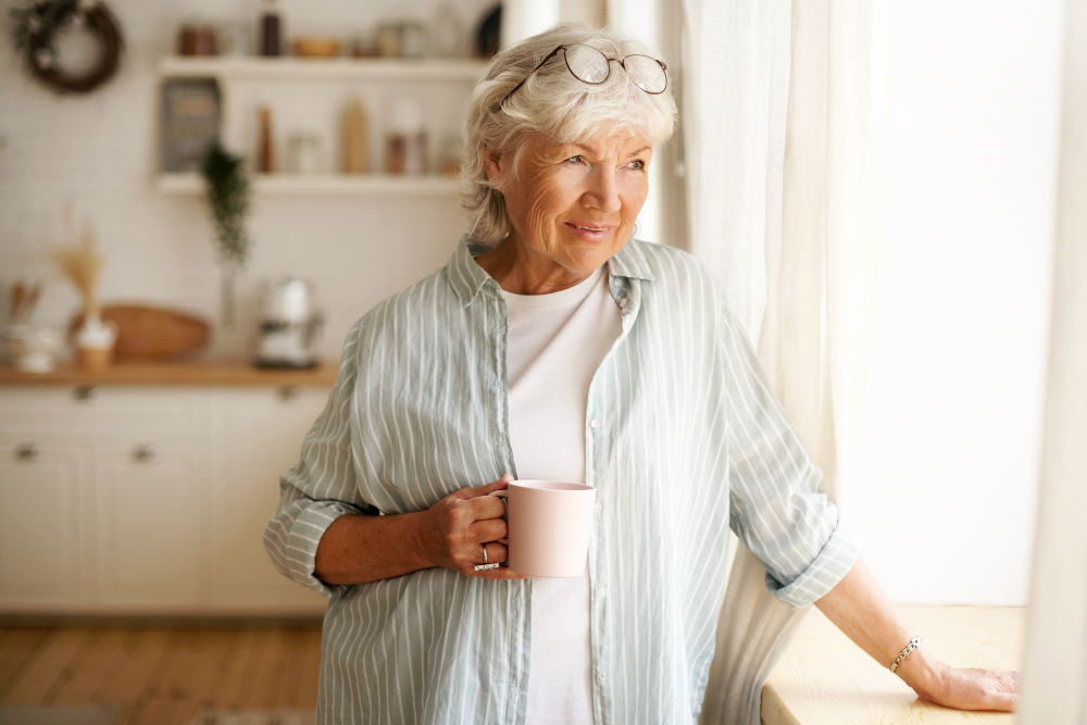 Woman enjoying a cup of coffee at home